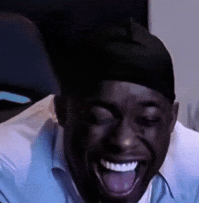 Man In Hat Laughing With Tongue Out GIF