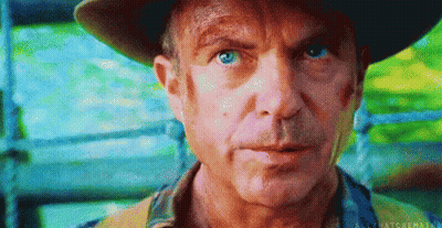 Man In Hat Looking At Camera GIF