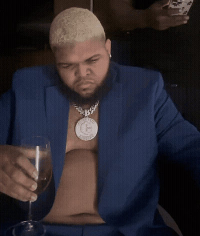 Man In Hat Looking At Phone, Another Man Looking On GIF