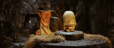 Man In Hat Looking At Statue GIF