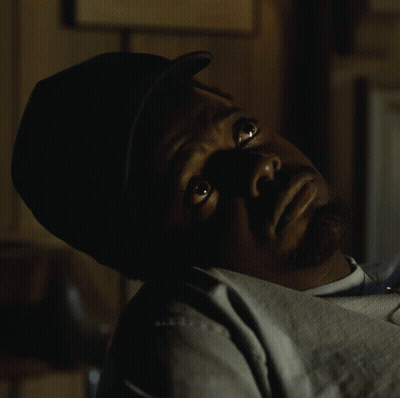 Man In Hat Lying Down Looking Up GIF