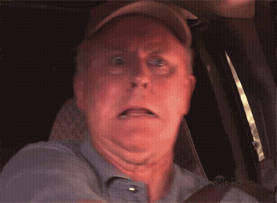 Man In Hat Making Funny Face In Car GIF