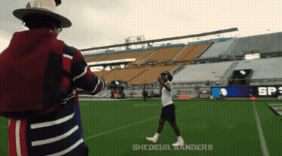 Man In Hat On Football Field Shedeur Sanders GIF