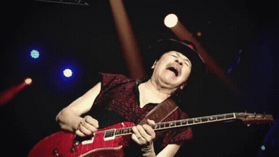 Man In Hat Playing Red Guitar On Stage GIF