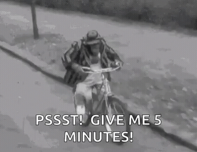 Man In Hat Riding Bicycle GIF