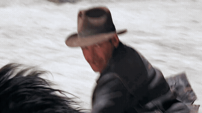 Man In Hat Riding Horse In Snow GIF