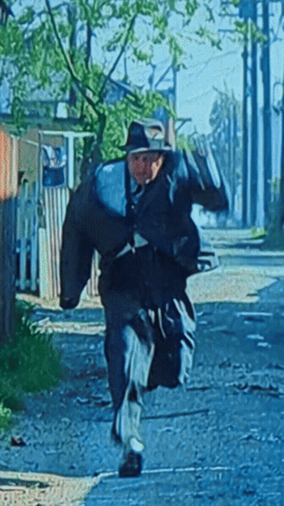 Man In Hat Running With Bag GIF