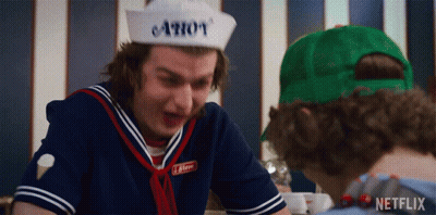 Man In Hat Saying Ahoy Talking To Another Man GIF
