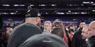 Man In Hat Saying I Love You To Crowd GIF