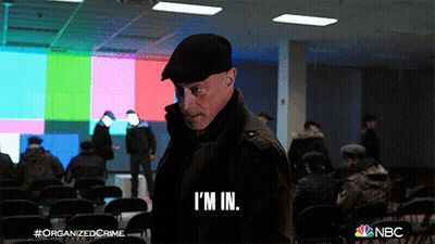 Man In Hat Saying I'm In On Cell Phone GIF