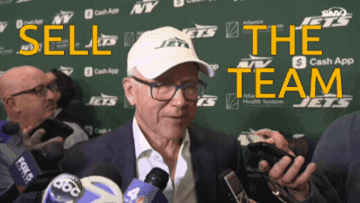 Man In Hat Saying Jets Talks To Reporters GIF
