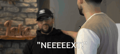 Man in Hat Saying Neeeext to Another Man