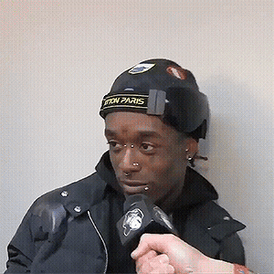 Man In Hat Saying Paris Interviewed GIF