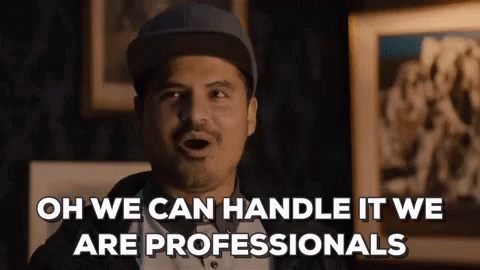 Man In Hat Saying We Are Professionals GIF