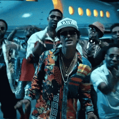 Man In Hat Saying XXIV Stands In Crowd GIF