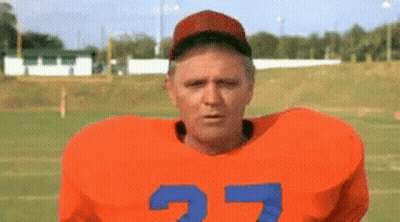 Man In Hat Saying You Can Do It In Crowd GIF