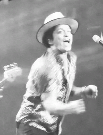 Man In Hat Singing Into Mic GIF