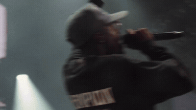 Man In Hat Singing Into Microphone GIF