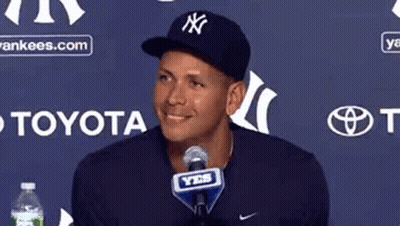 Man In Hat Sitting At Microphone GIF
