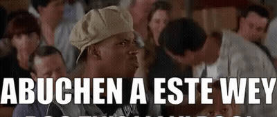 Man In Hat Sitting Before Crowd Saying Abuchen A Este Wey GIF