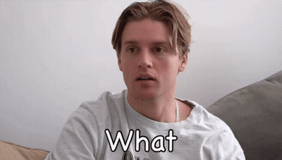 Man In Hat Sitting In Back Seat Of Car Saying A Map GIF