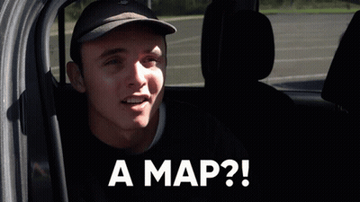 Man In Hat Sitting In Back Seat Saying A Map GIF