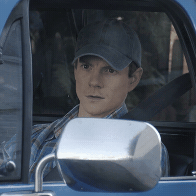 Man In Hat Sitting In Blue Car GIF