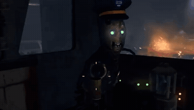 Man In Hat Sitting In Dark Room GIF