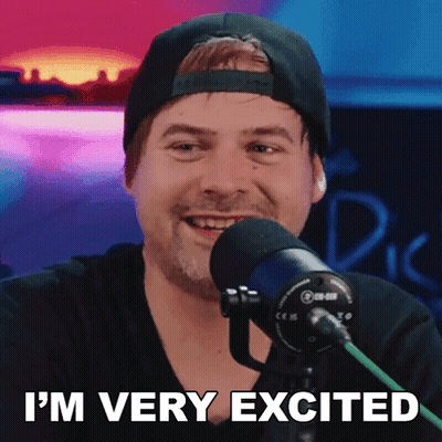 Man In Hat Smiling At Microphone Saying I'm Very Excited GIF