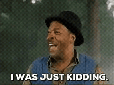 Man In Hat Smiling Saying I Was Just Kidding GIF