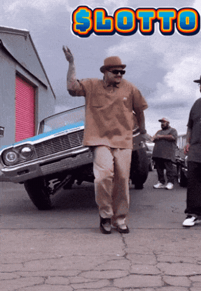 Man In Hat Standing In Front Of Lotto Car GIF