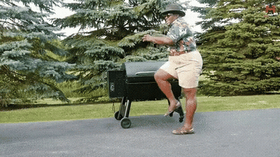 Man In Hat Standing On Grill GIF