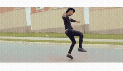 Man In Hat Standing On One Leg GIF