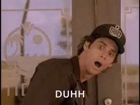 Man In Hat Surprised In Front Of Door GIF