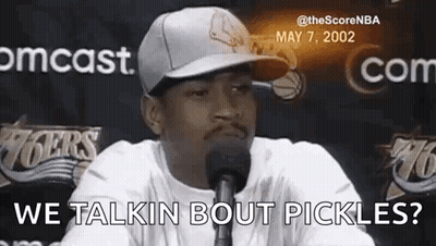 Man In Hat Talking Into Microphone Saying We Talkin Bout Pickles GIF