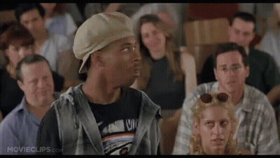 Man In Hat Talking To Group In Classroom GIF