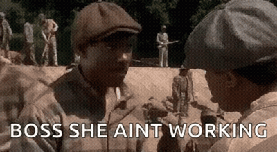 Man In Hat Talking To Man In Field GIF