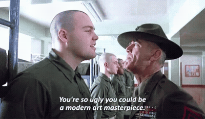 Man In Hat Talking To Man In Military Uniform With Another Man Looking On GIF