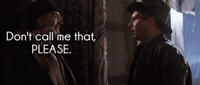 Man In Hat Talks To Another Saying Don't Call Me That Please GIF