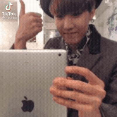Man In Hat Thumbs Up Holding Tablet GIF