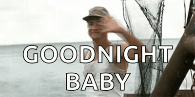 Man In Hat Waving On Boat GIF