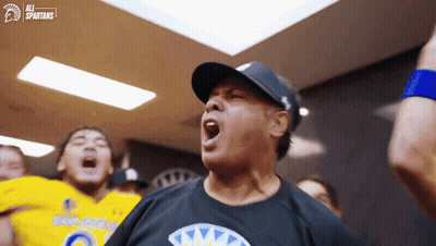 Man In Hat Wearing All Spartans Shirt GIF