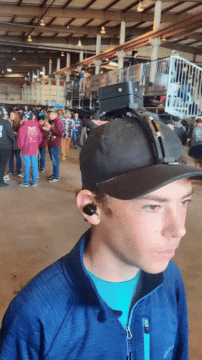 Man In Hat With Camera And Columbia Jacket GIF