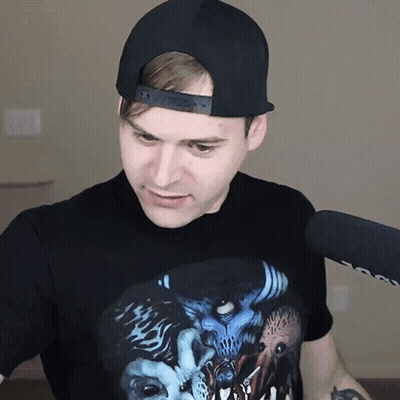 Man In Hat With Demon T-Shirt GIF
