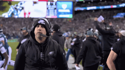 Man In Hat With Eagles On Football Field GIF
