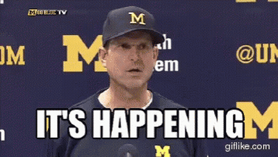 Man In Hat With Letter M Saying It's Happening GIF