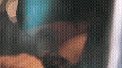 Man In Hat With Letter P Covering Mouth GIF