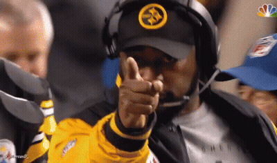 Man In Hat With Letter S Pointing GIF