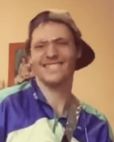 Man In Hat With Medal Smiling Funny Face GIF