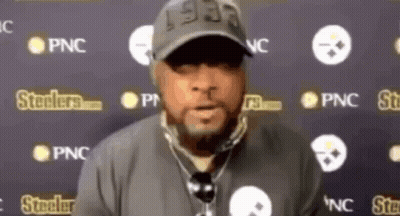 Man In Hat With Microphone In Front Of Steelers Logos GIF
